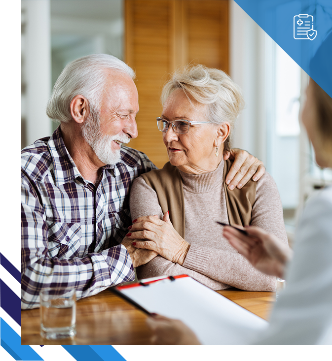 Senior couple discussing health insurance plan.