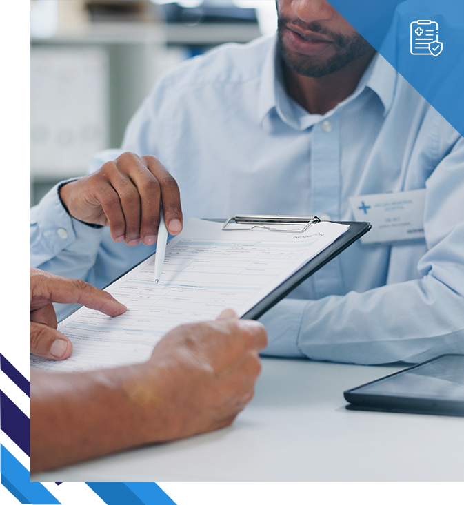 Man reviewing paperwork with a client.